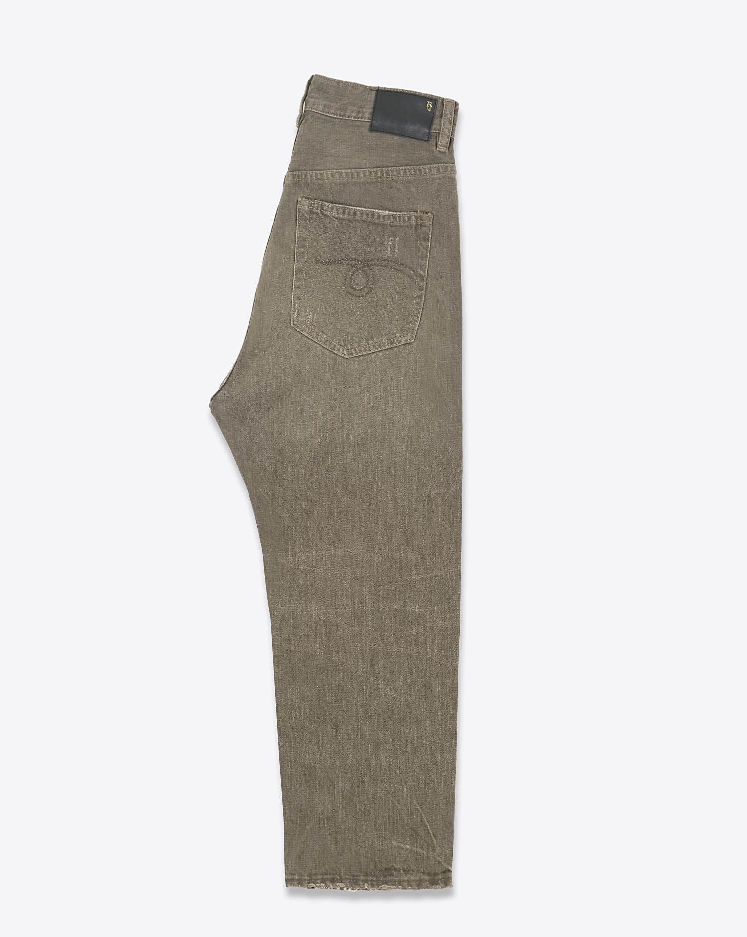 Jean baggy Tailored Drop toile kaki usée et déchirée R13 denim. Profil.