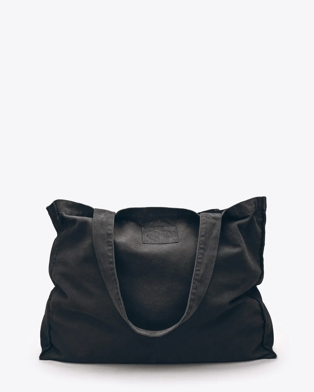 Mikuta Cabas large en toile noir délavé. Face.